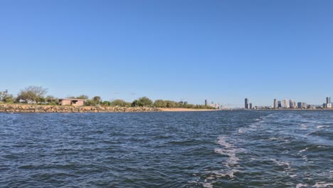 scenic boat journey with city skyline views