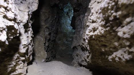 a tunnel in a rock cave