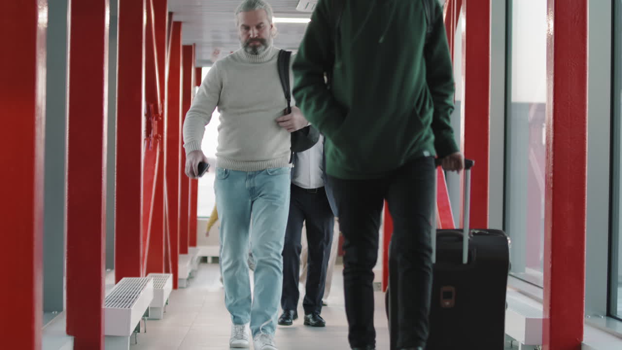 Passengers Walking Down Ramp