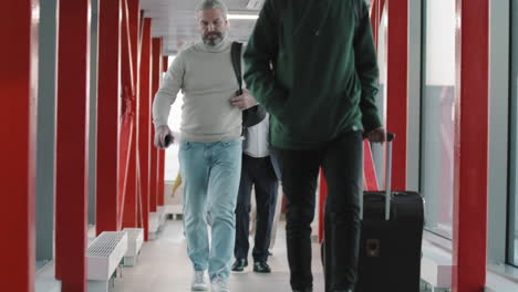 passengers walking down ramp