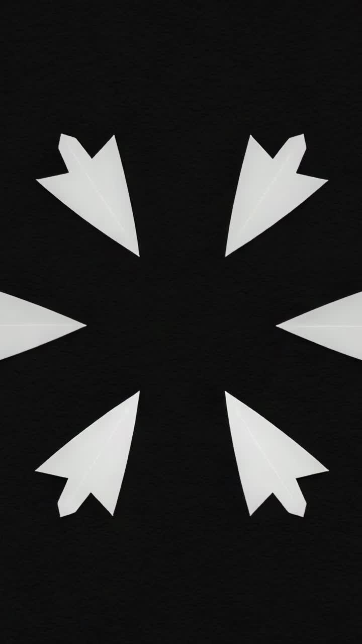 Vertical video: Rotating six white arrowheads clockwise on dark screen completing revolution