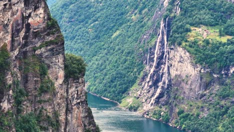 Aerial-View-of-Scenic-Norwegian-Fjord,-Cliffs-and-Waterfall