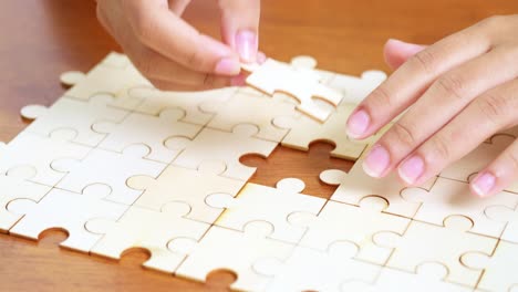 a close-up of a nearly completed jigsaw puzzle illustrating the joy of problem-solving