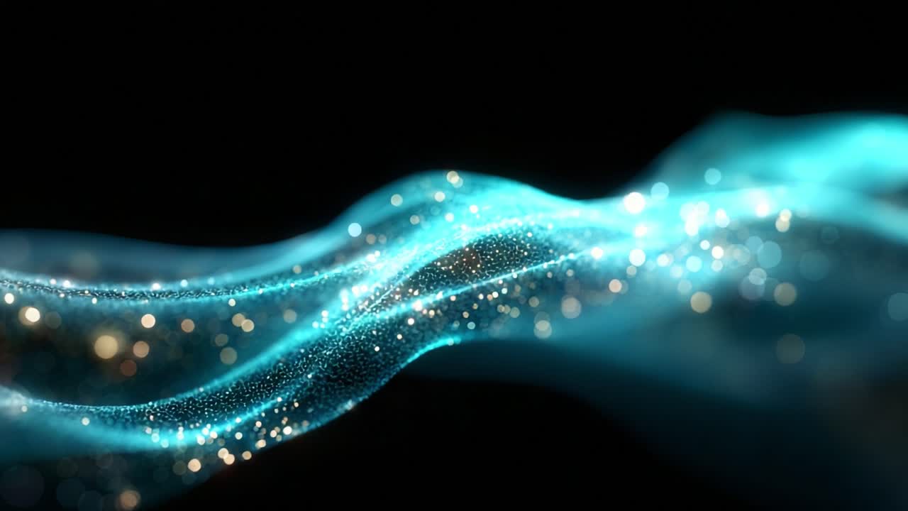 A captivating display of shimmering blue energy waves flows gracefully against a dark backdrop, showcasing sparkling particles that create a mesmerizing visual effect and sense of motion