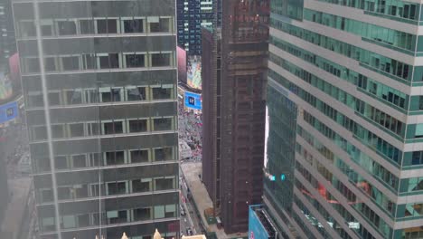 Aerial-birds-eye-overhead-top-down-view-of-tall-office-of-apartment-buildings