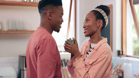 Coffee,-love-and-couple-in-a-kitchen-talking