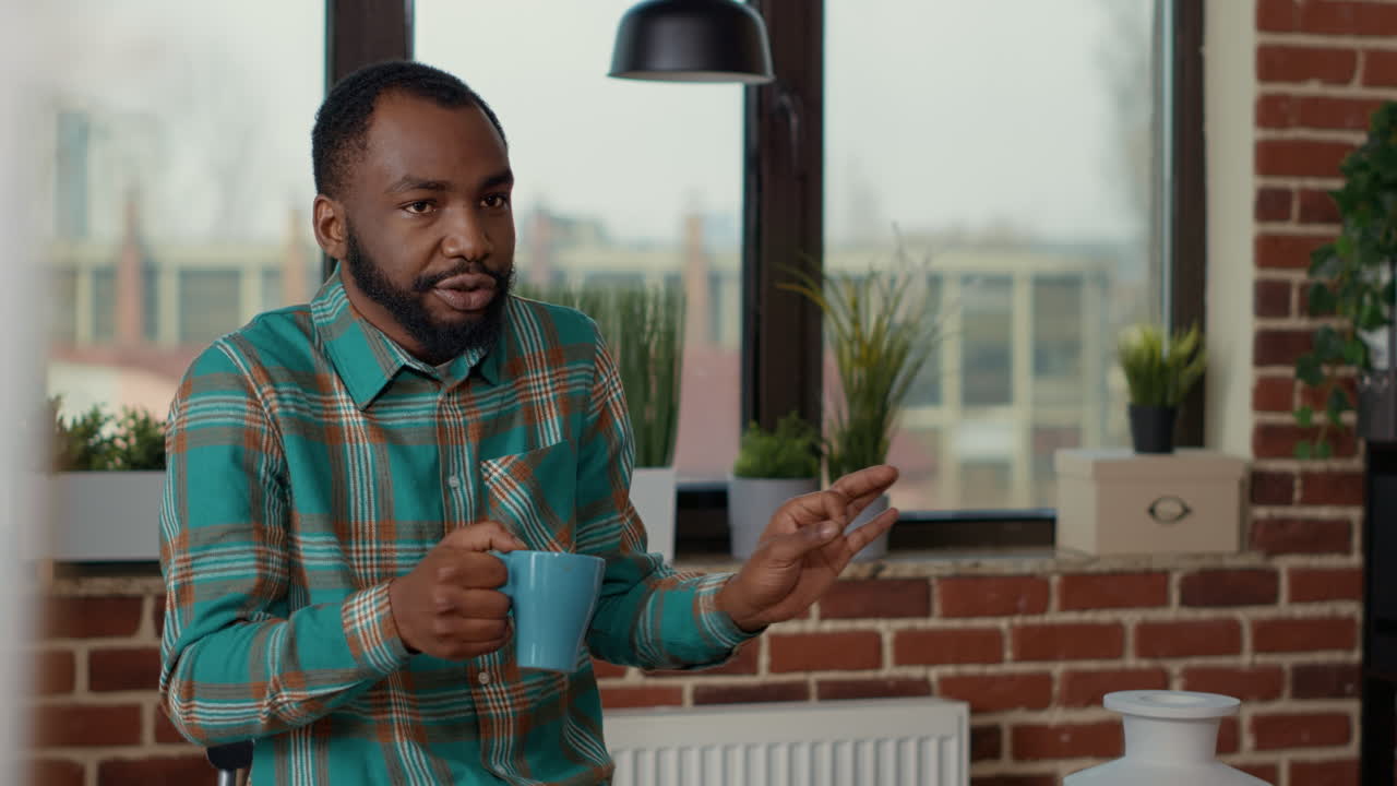 Young man teaching drawings skills to creative people