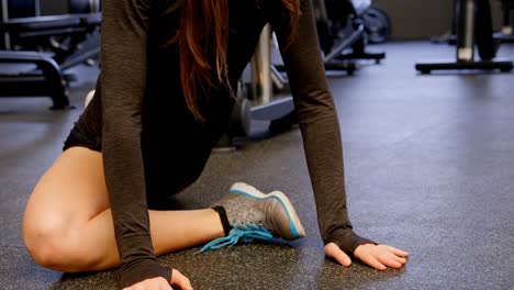 Woman-exercising-in-fitness-studio-4k