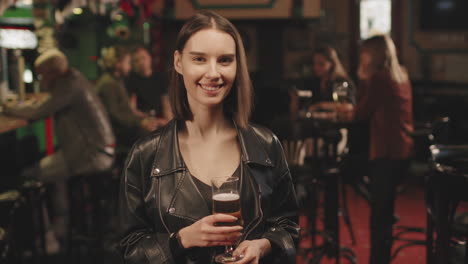 portrait of attractive young woman at bar