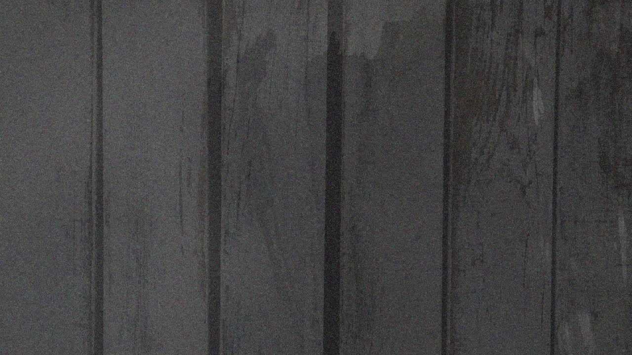 회색 배경에 고통받는 모양의 애니메이션