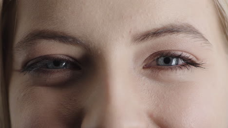 close-up-woman-blue-eyes-looking-happy-expression-smiling-enjoying-healthy-eyesight-natural-beauty