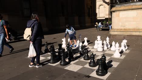 people playing giant chess in melbourne