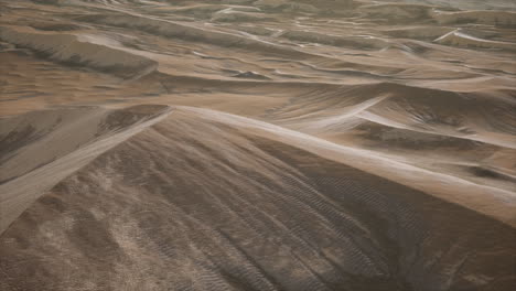 red sand desert dunes at sunset