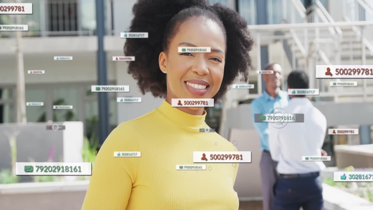 Animation of icons and numbers with data processing over african american businesswoman
