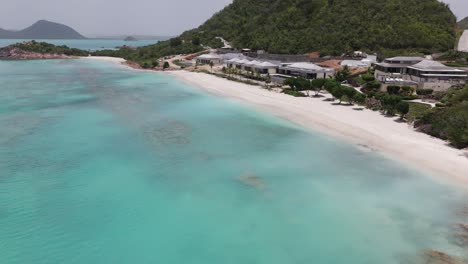 hermitage bay beach resort at pearns point peninsula in antigua and barbuda. aerial drone shot