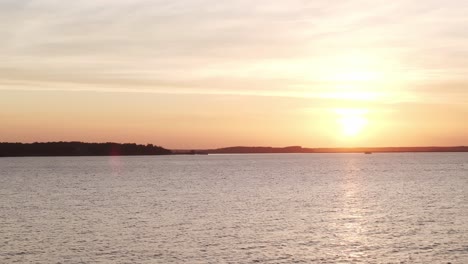 peaceful dusk at harbor with soft light on water, showing stillness and quiet surroundings
