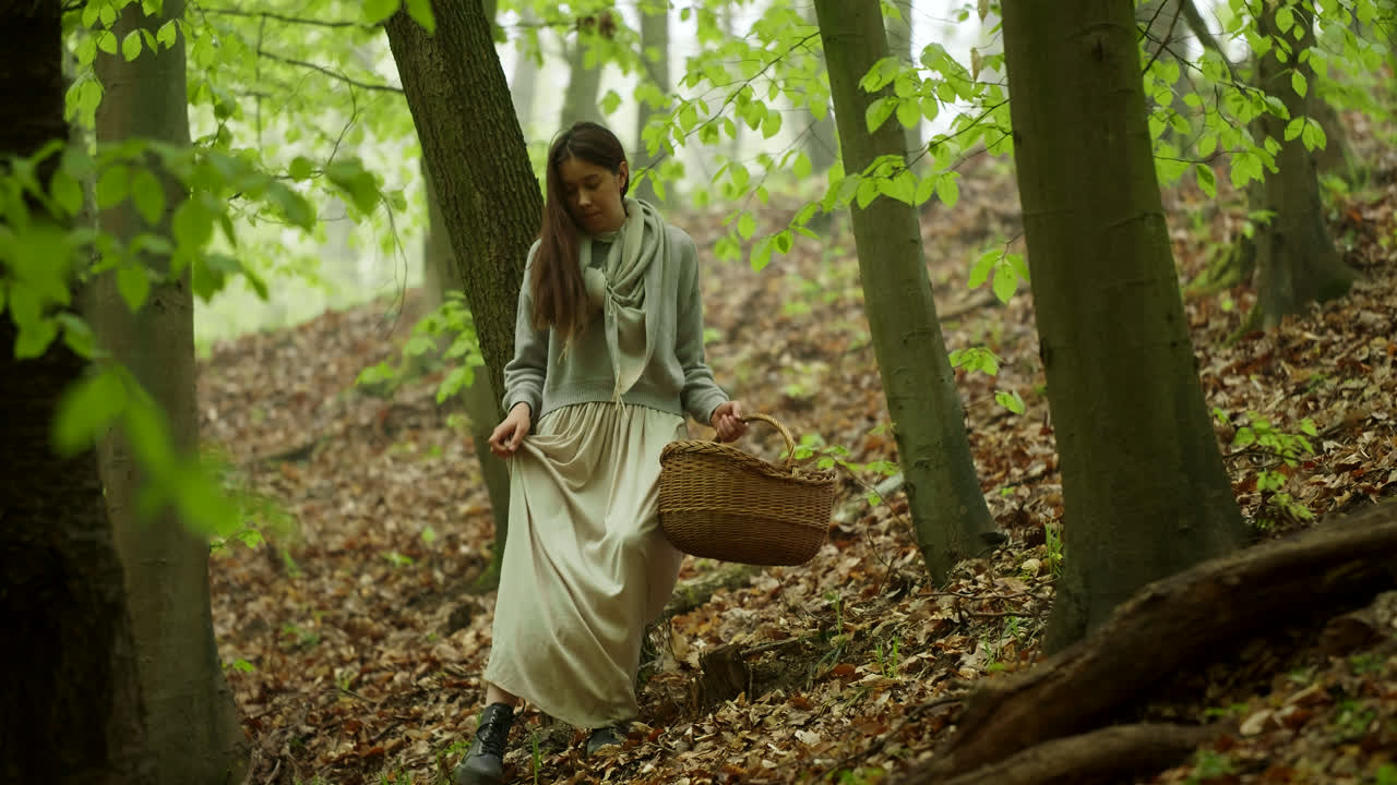 Woman Hiking in a Forest with Basket