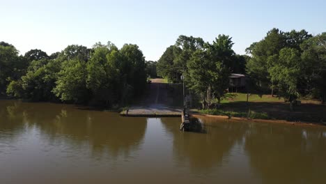 Alabama-River-in-Boykin,-Alabama-showing-ferry-dock-with-drone-video-moving-forward