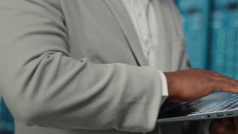 data center system administrator reviewing code for automation scripts