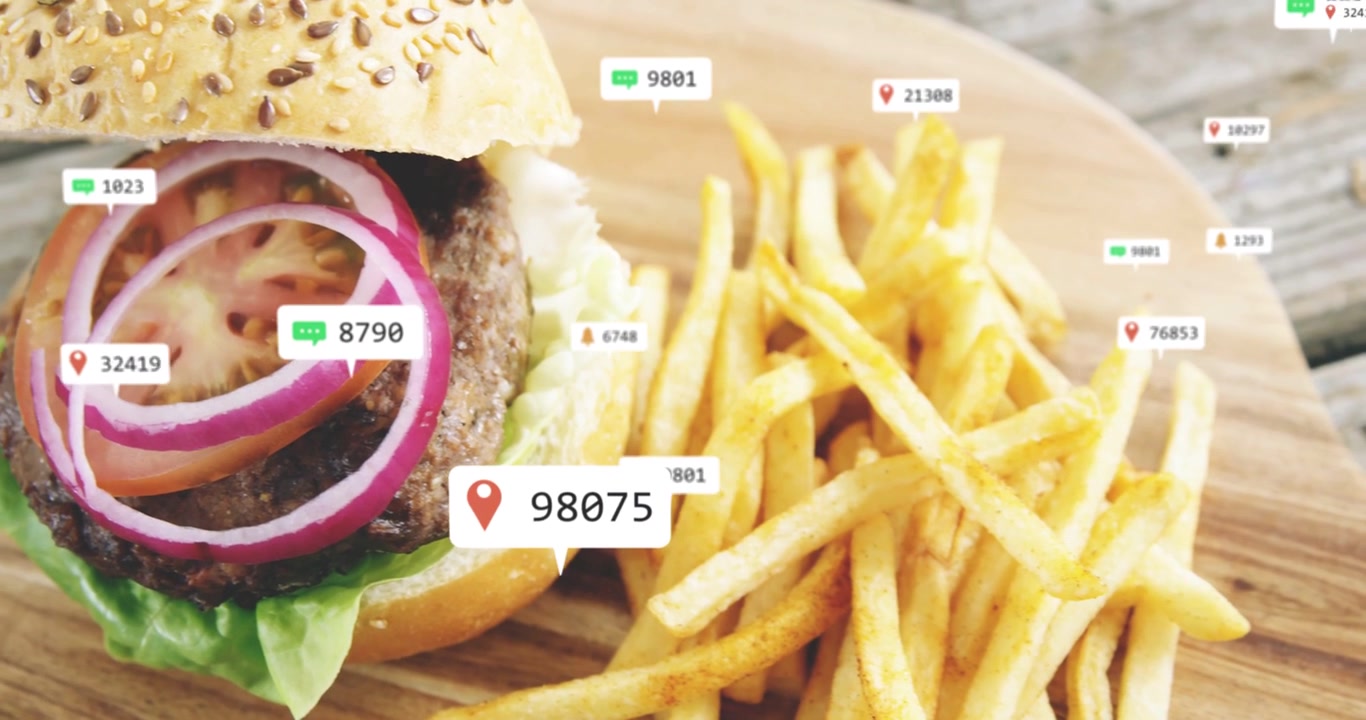 Burger and fries attracting map pins, chat icons, number badges as camera panning for marketing