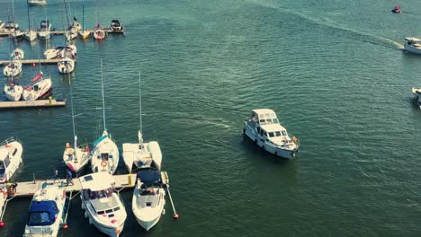 motorboat leaving the marina at the lake