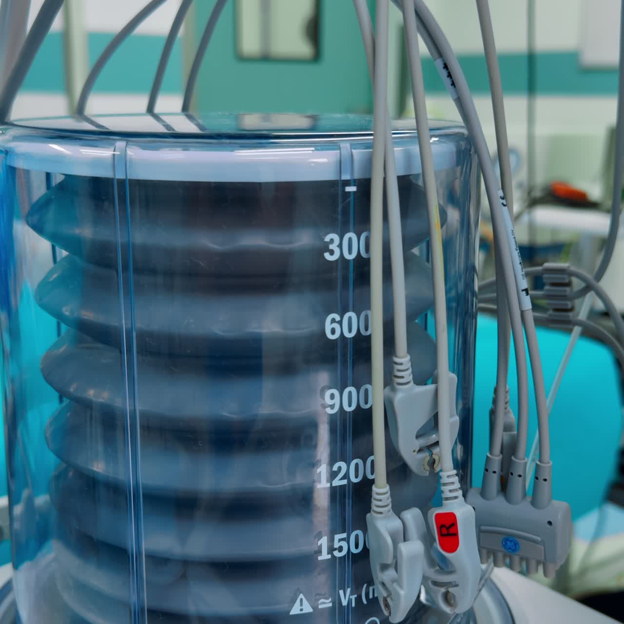 Lung ventilator pumping air to a patient. Life-saving equipment in modern surgery room. Close up. Vertical screen