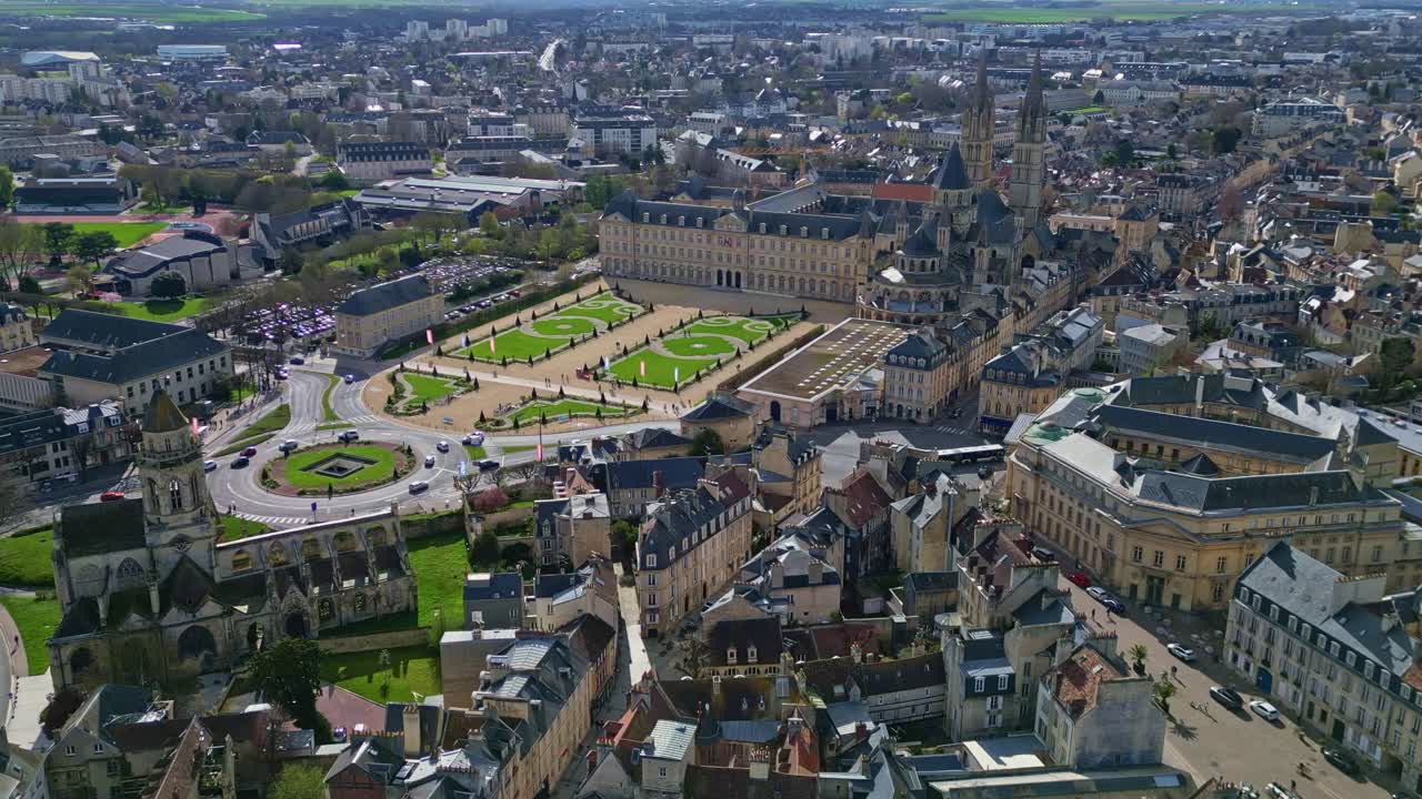 Caen town hall, historic Eglise Saint-Étienne-le-Vieux church ruins, Abbaye aux Hommes or Abbey men, cityscape, France. Aerial drone view