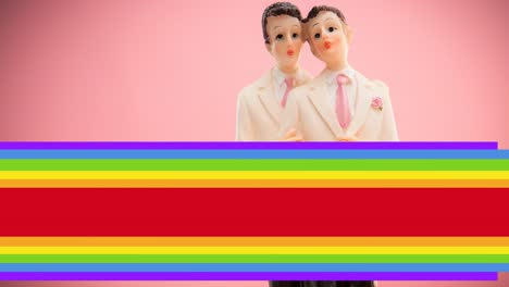 Animation-of-rainbow-flag-over-gay-couple-figure