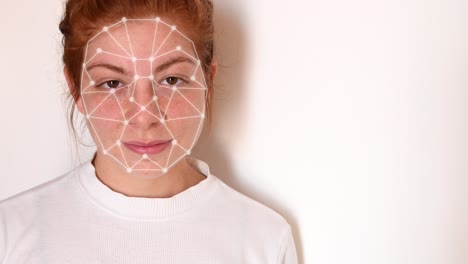 close up of a young woman with red hair, with a white shirt on a white background, with facial recognition high tech animation with tracking points and a glow effect on her face