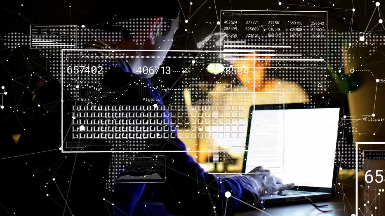 Mann som skriver på bærbar PC i et dempet arbeidsområde, med HUD som overlapper hendene og oppdaterer dataanalyse