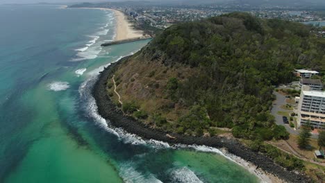 Burleigh-Heads-headland-looking-high-towards-Palm-Beach,-waves-breaking,-Beautiful-summers-day,-static