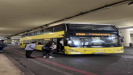 double-decker bus at a station