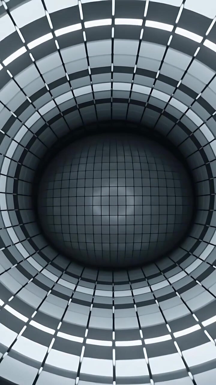 Vertical video: Pulling camera showing tiles morphing into sphere forming lit rings in 3D chamber
