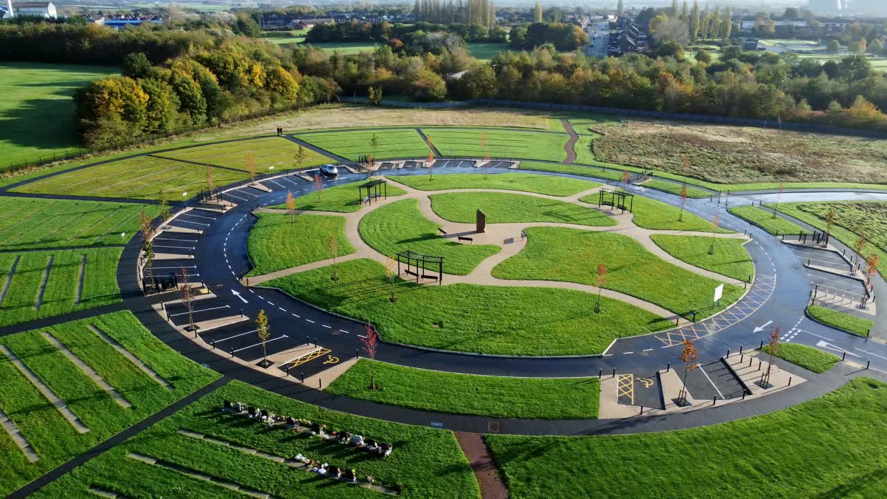 Modern circular cemetery shining wet pathway design aerial view artistic garden of rest orbit right