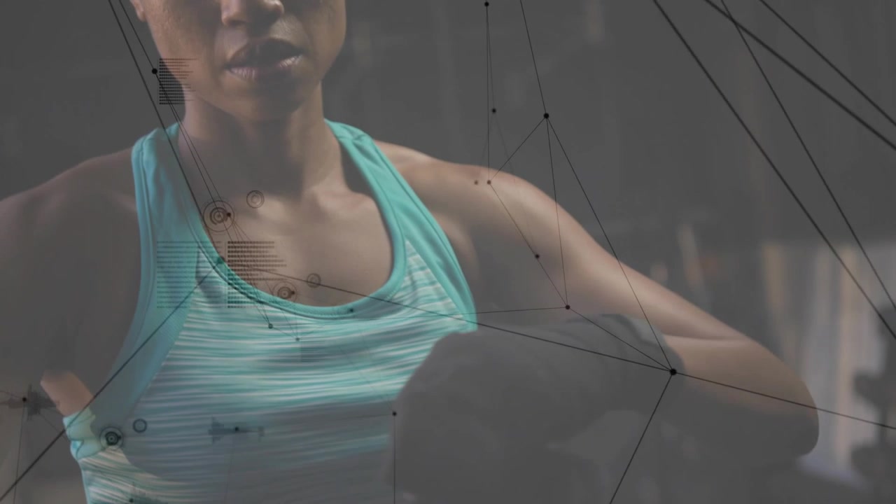 Woman wrapping hands in gym, threading wraps while network overlay guiding training prep