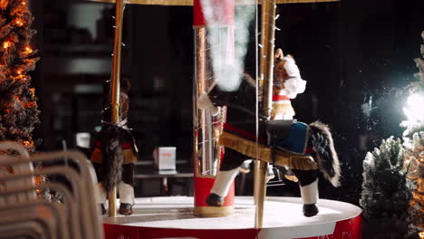 carousel horses in festive holiday display