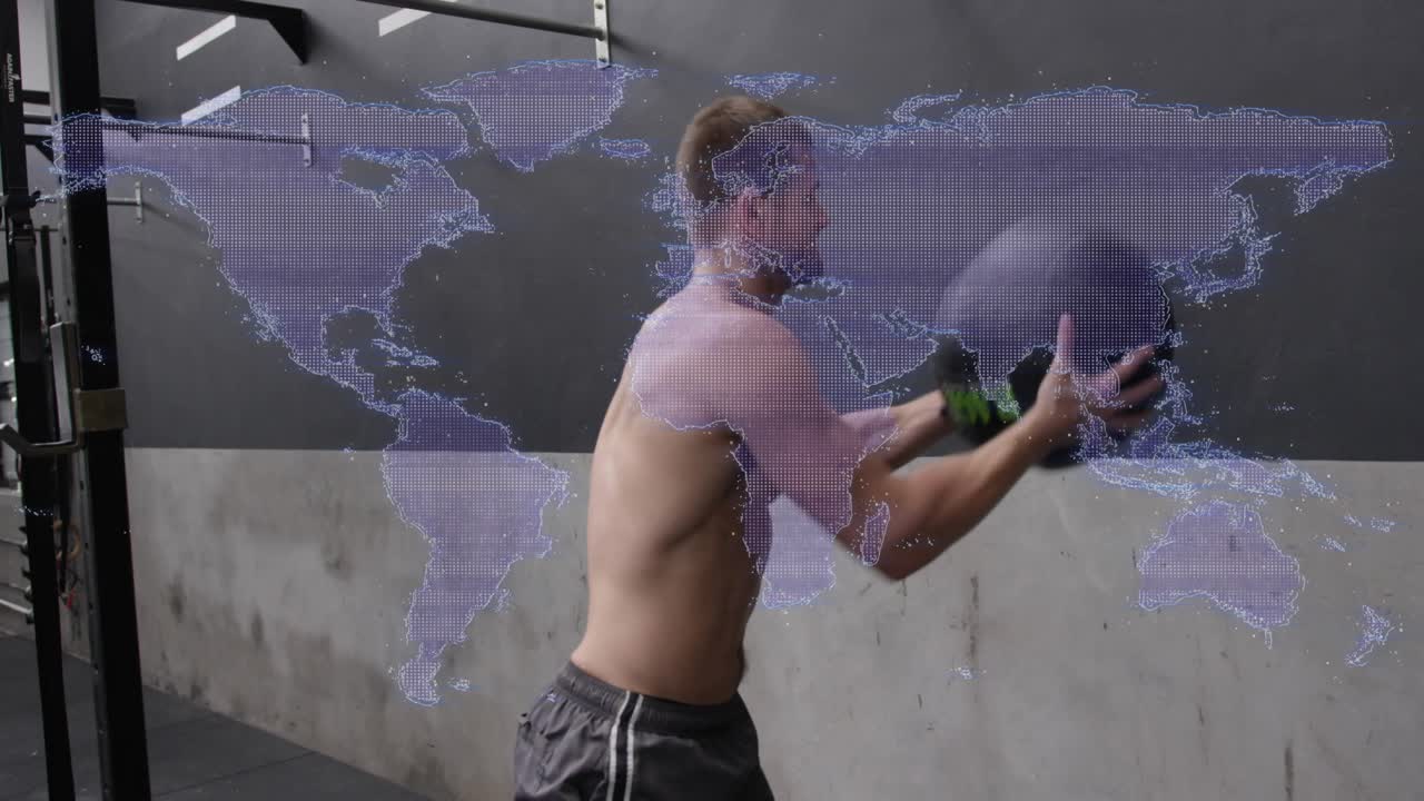 Man doing medball wall throws for strength in gym, pulling inward, powering with purple map overlay
