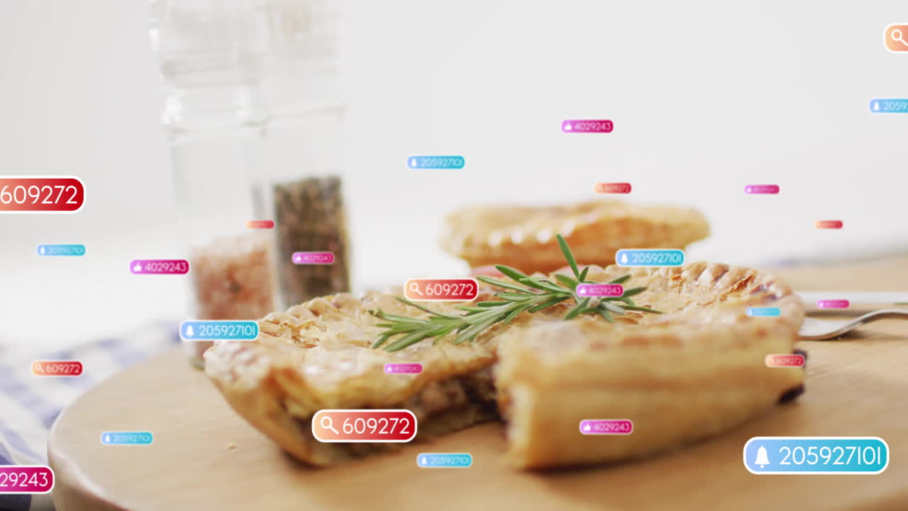 Savory pies on wooden board with floating colorful data tags animation