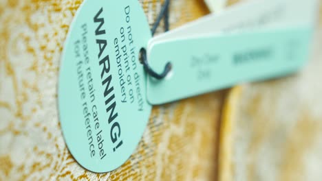 clothing care label with warning