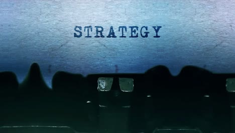 vintage typewriter with the word "strategy"