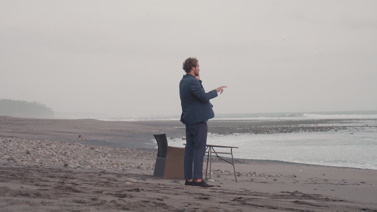 Businessman Working On Isolated Beach