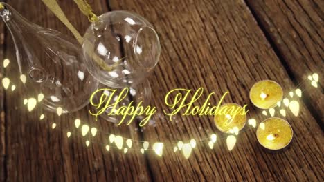 Animation-of-happy-holidays-text-over-christmas-tree-decorations