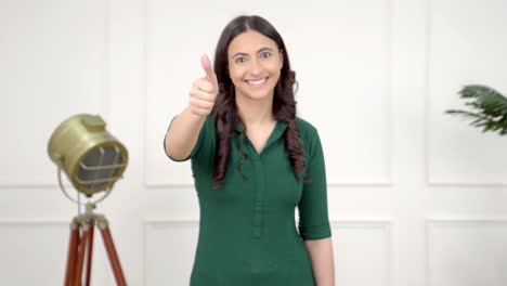 Happy-Indian-girl-showing-Thumbs-up