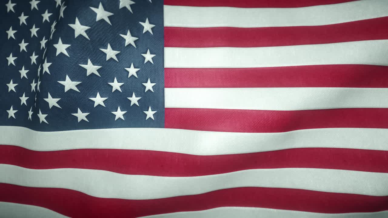 la bandera de los estados unidos ondeando en el viento.