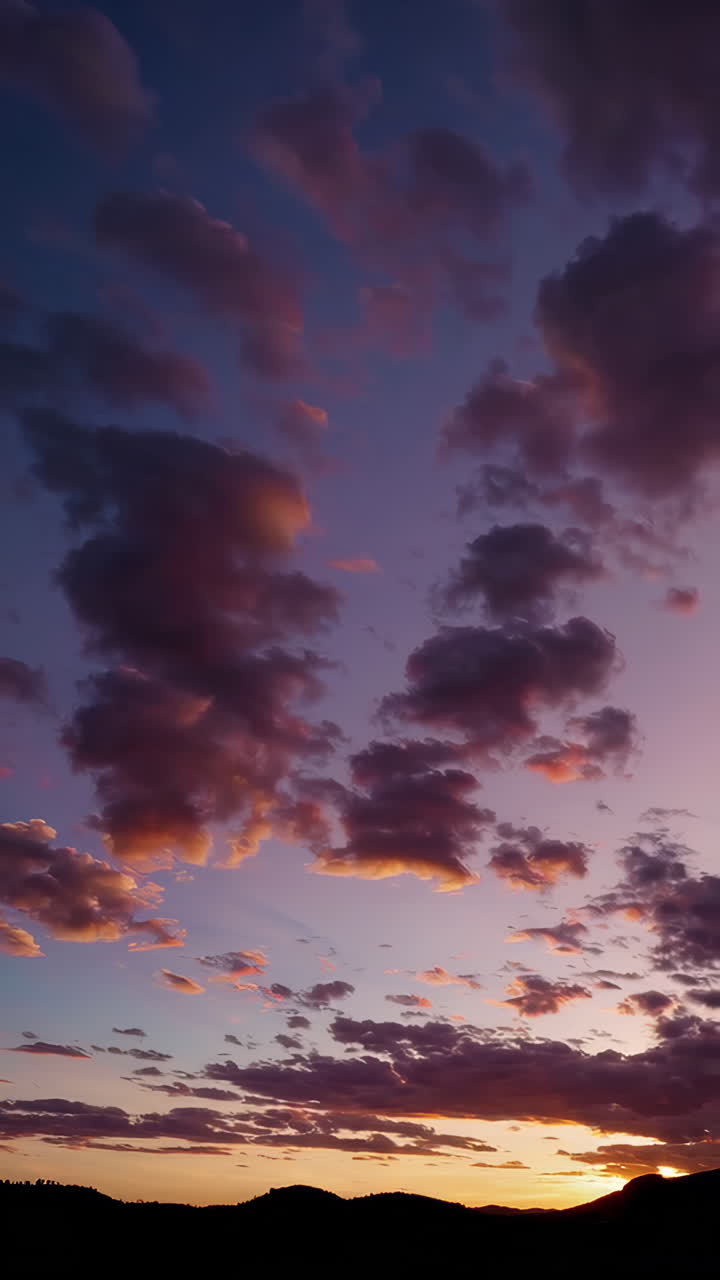 Colorful Sunset Cloudscape Over Mountains