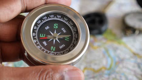 handheld compass and map
