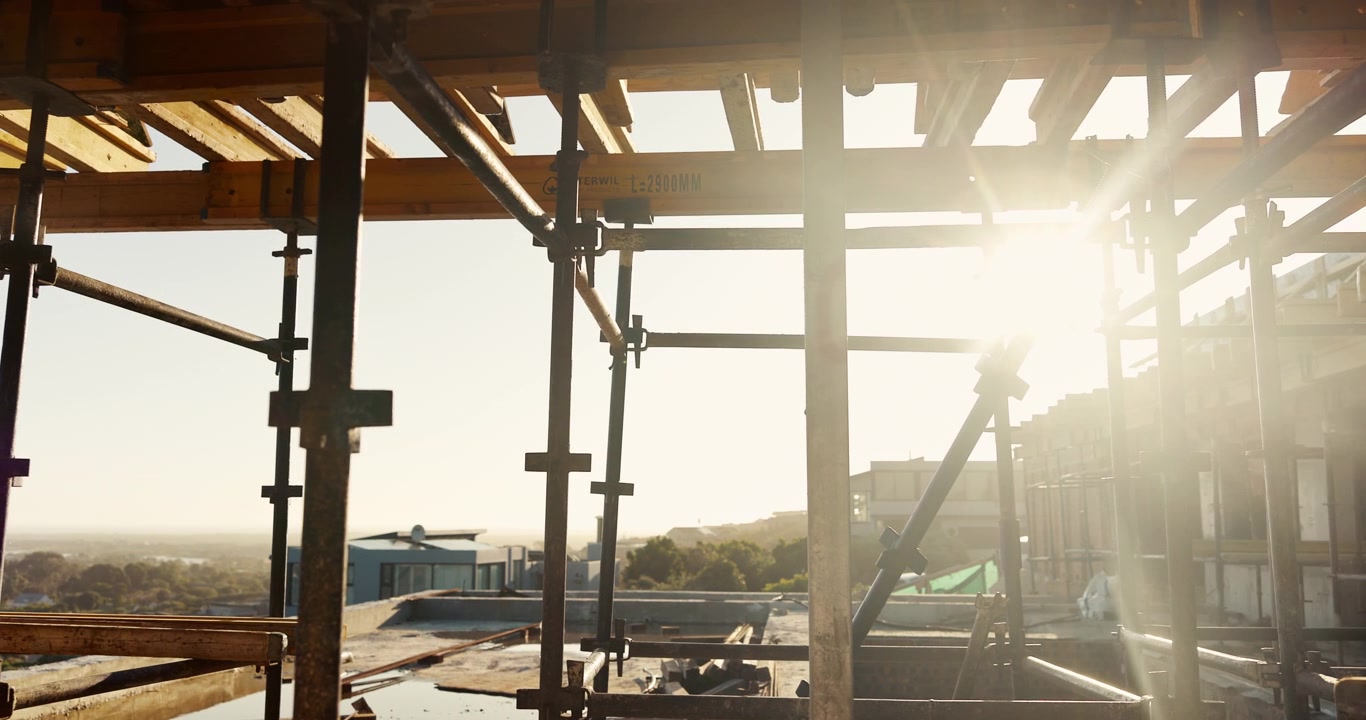 Construction Site Scaffolding at Sunset