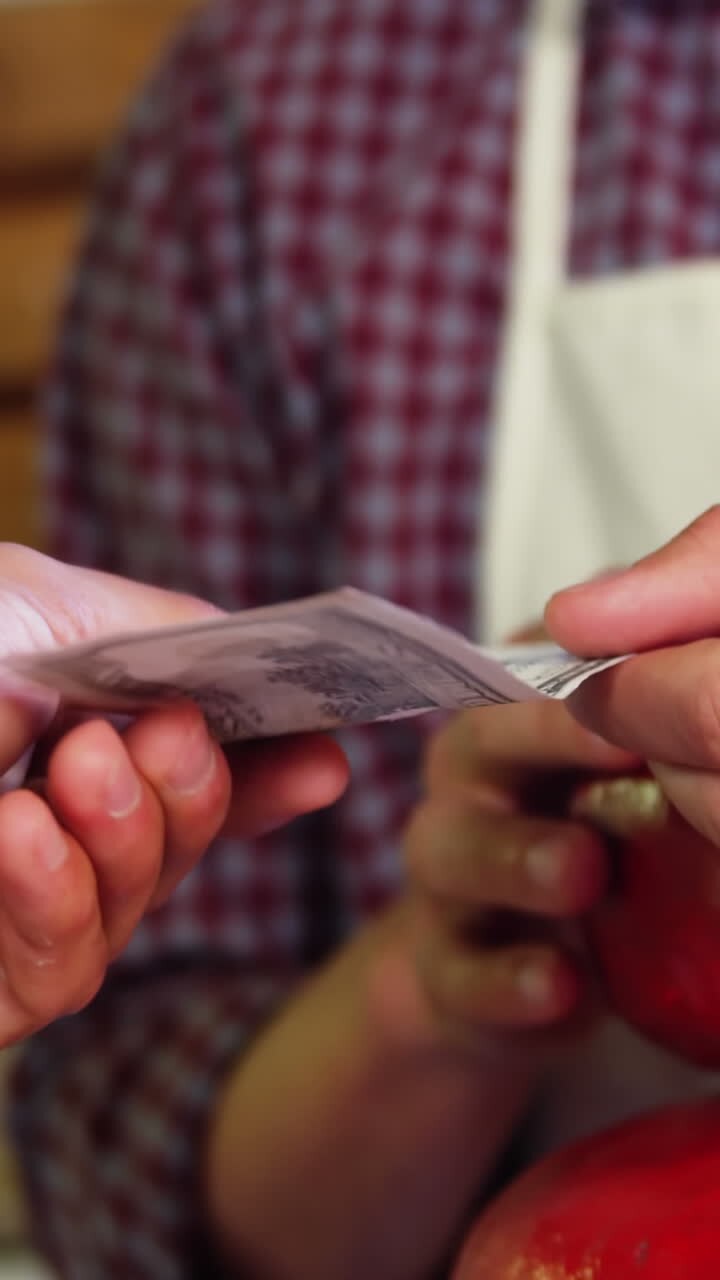 Customer purchasing gouda cheese in grocery section