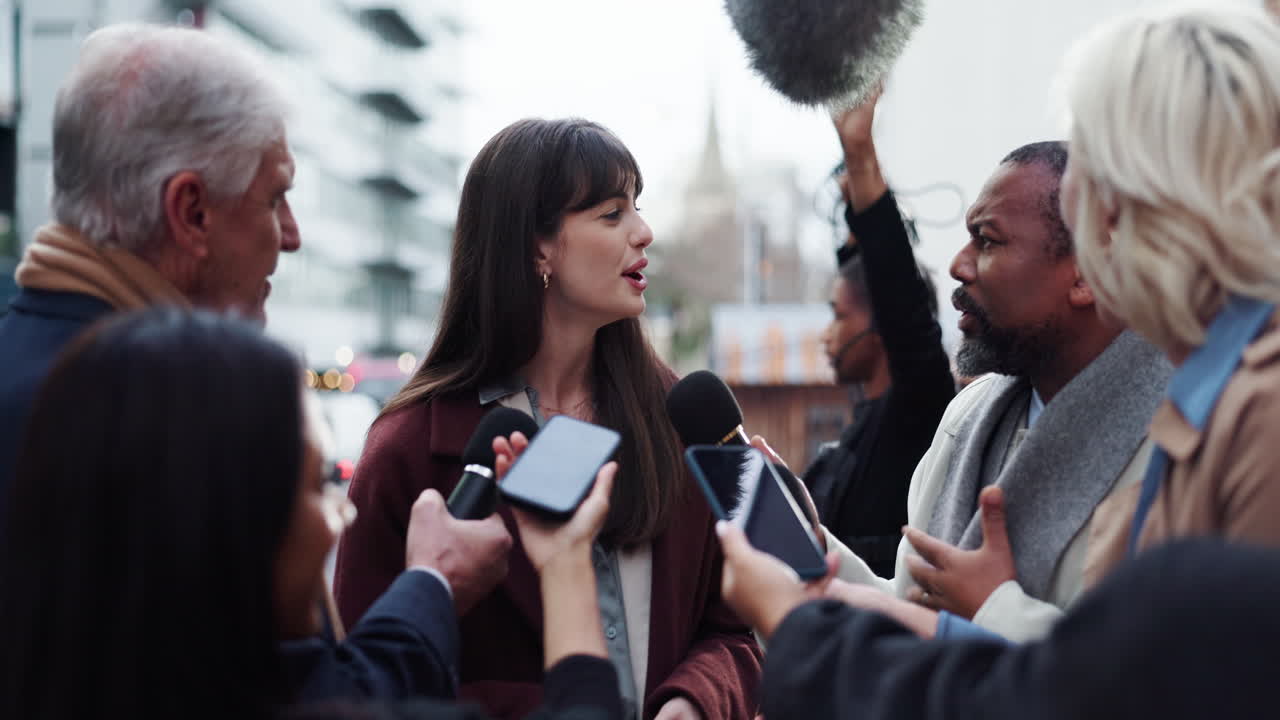 A press conference with a public figure being interviewed by reporters