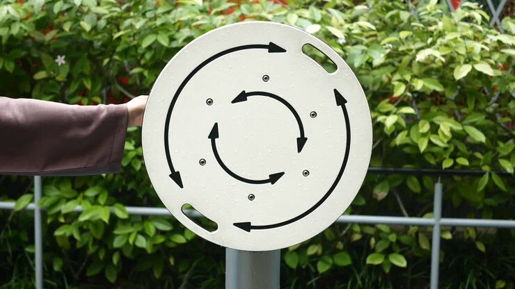 Women hand using spinner outdoor fitness equipment